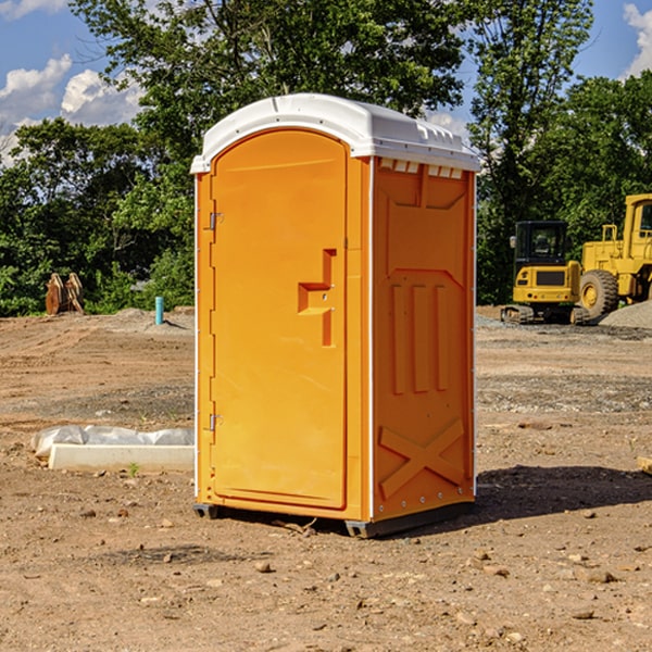 how often are the portable restrooms cleaned and serviced during a rental period in Dickinson County MI